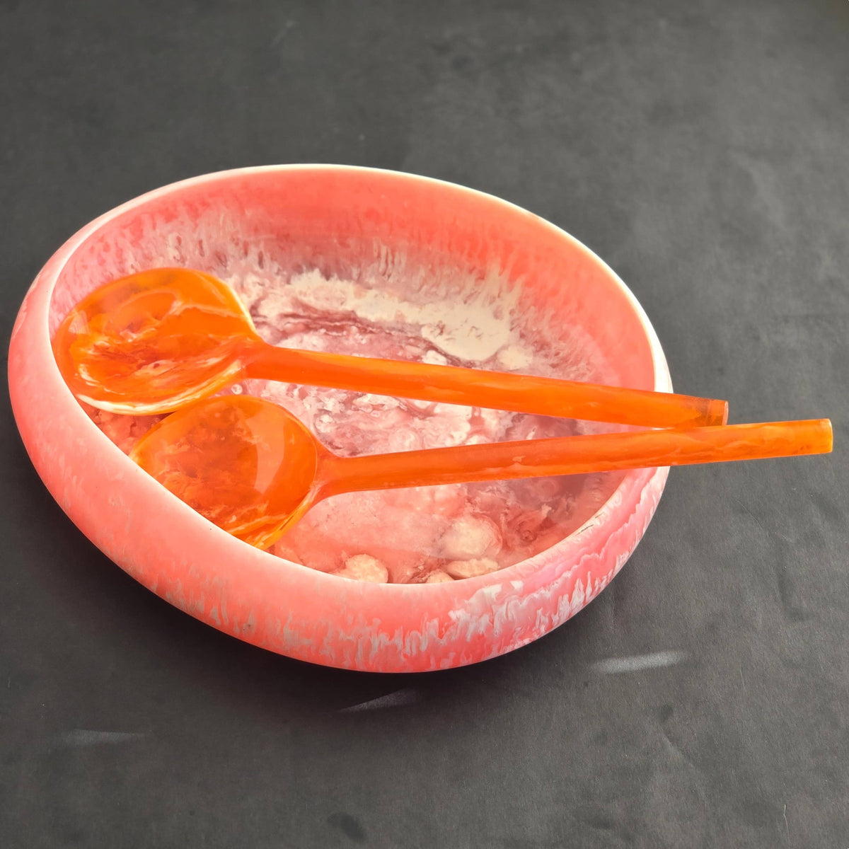 Pink Resin Serving Bowl with Orange Servers