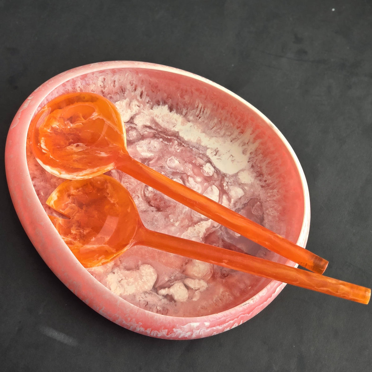 Pink Resin Serving Bowl with Orange Servers