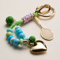 Load image into Gallery viewer, Tennis Charm Beaded Keychain with Heart Locket
