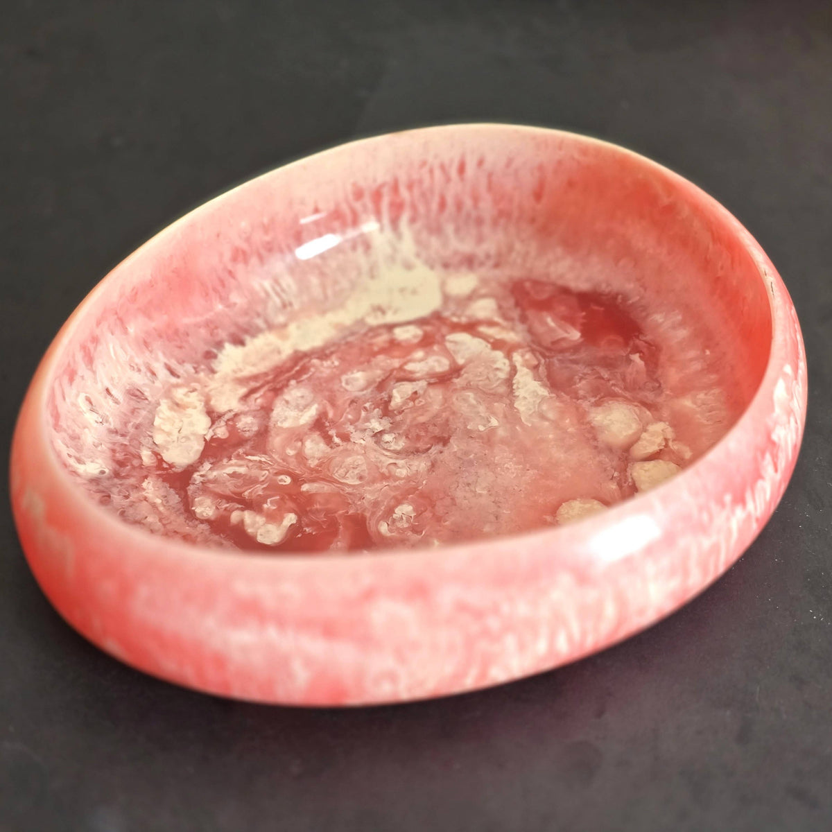 Pink Resin Serving Bowl with Orange Servers