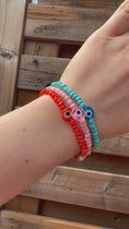 Load and play video in Gallery viewer, Multicoloured Evil Eye Bracelet
